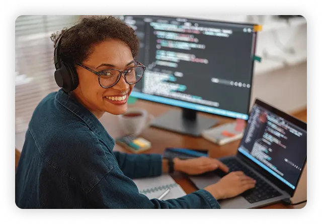 Two people looking at a computer screen