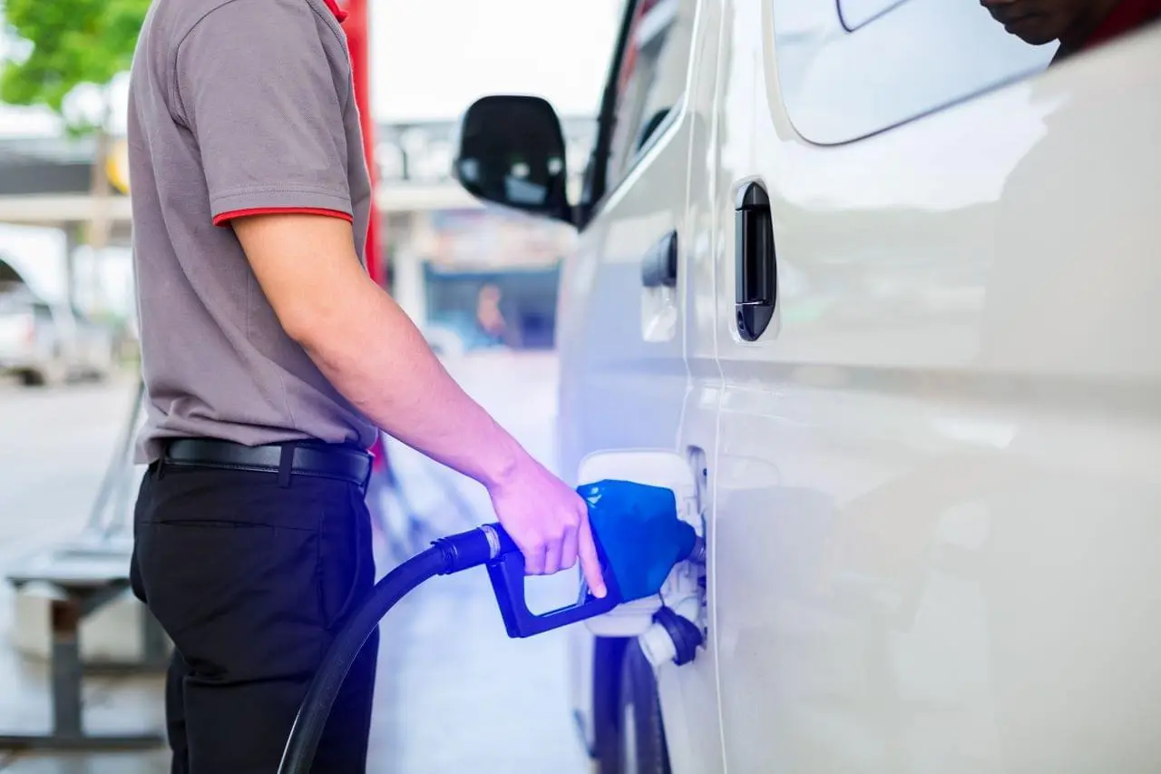 Person filling Gas in a van