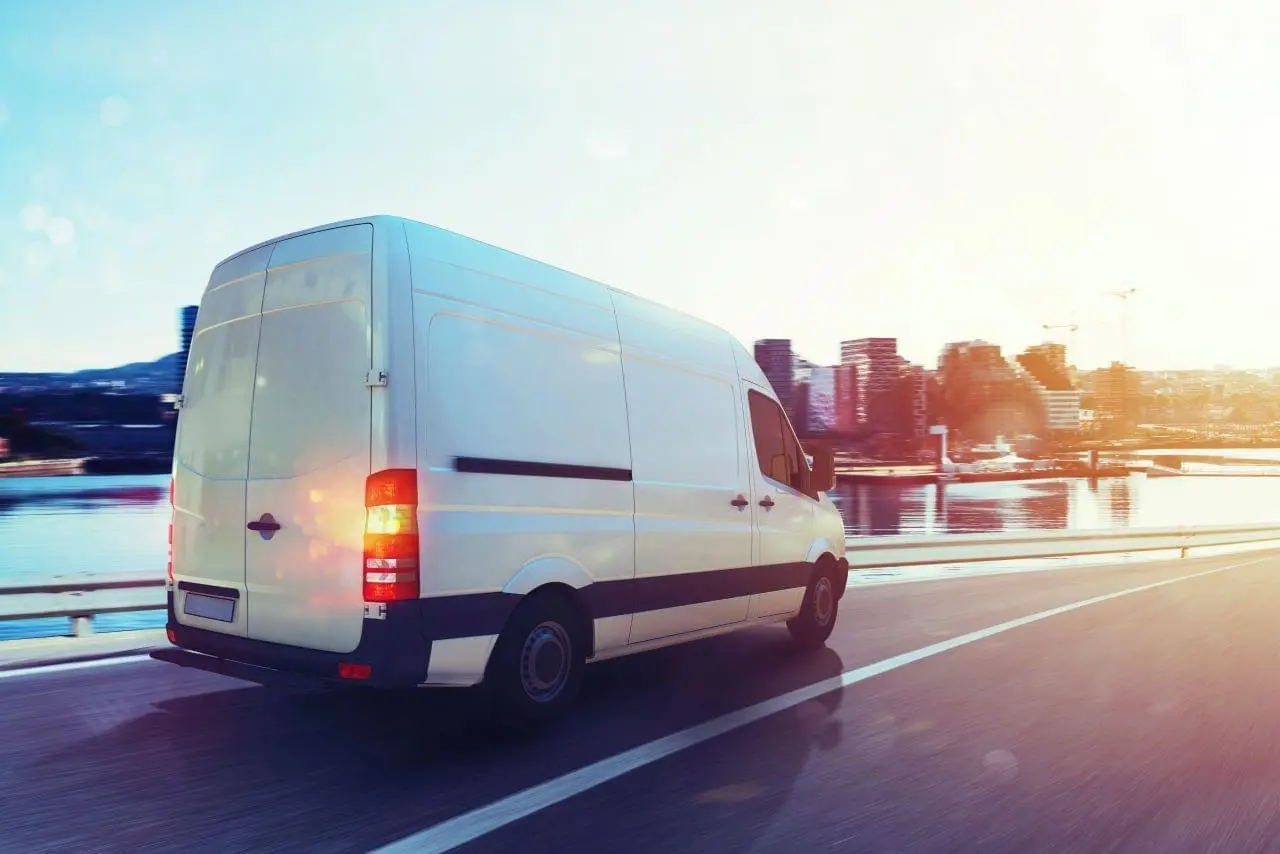 Van driving on a road
