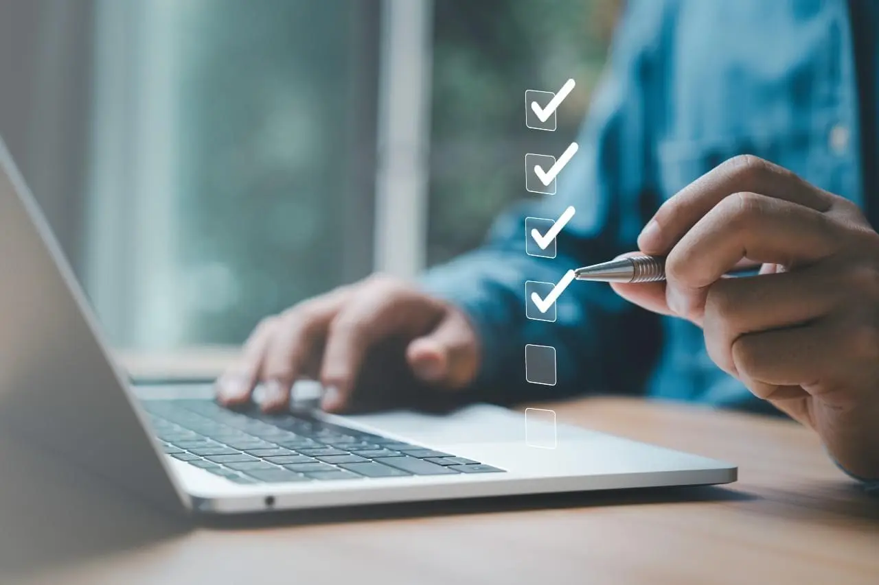 person checking off items in an illustration