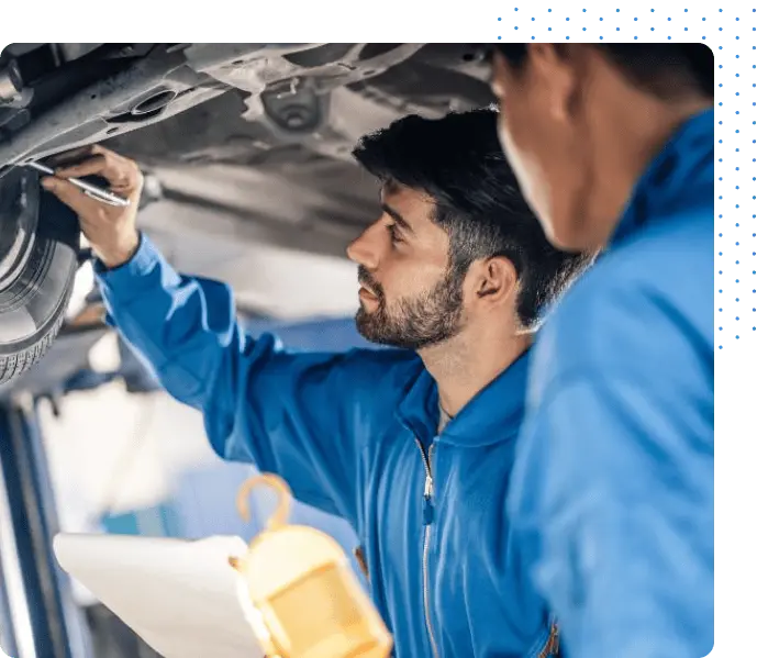 Mechanics Working Under Car Illustration