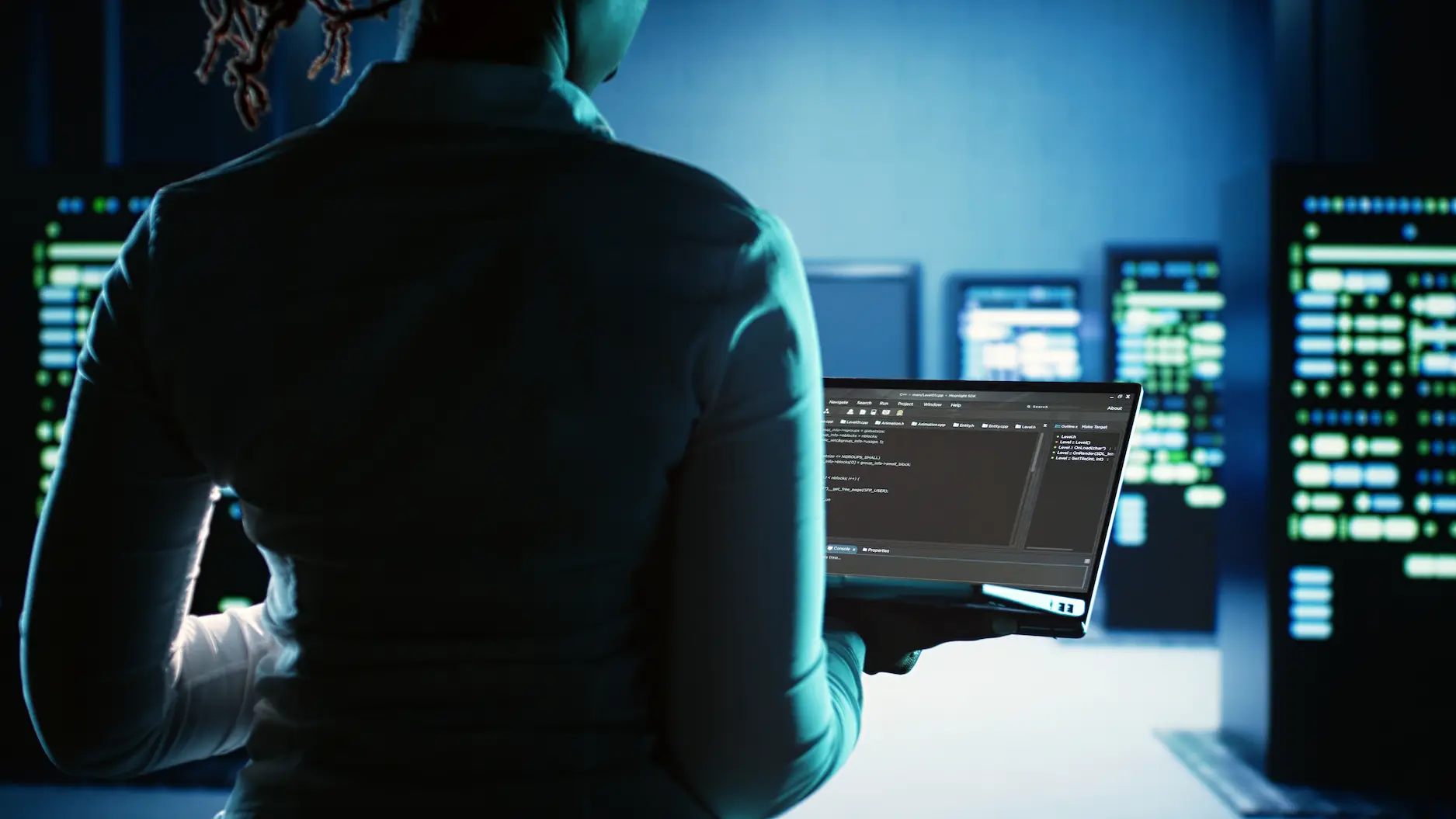 Software developer in a server room